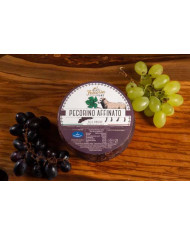 Pecorino affinato alle vinacce
